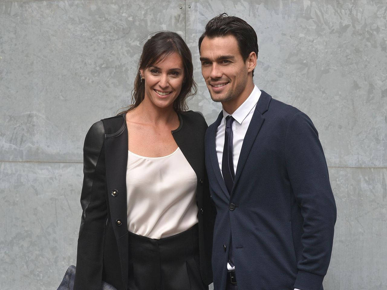 Flavia Pennetta And Her Husband Posing For A Picture Wallpaper