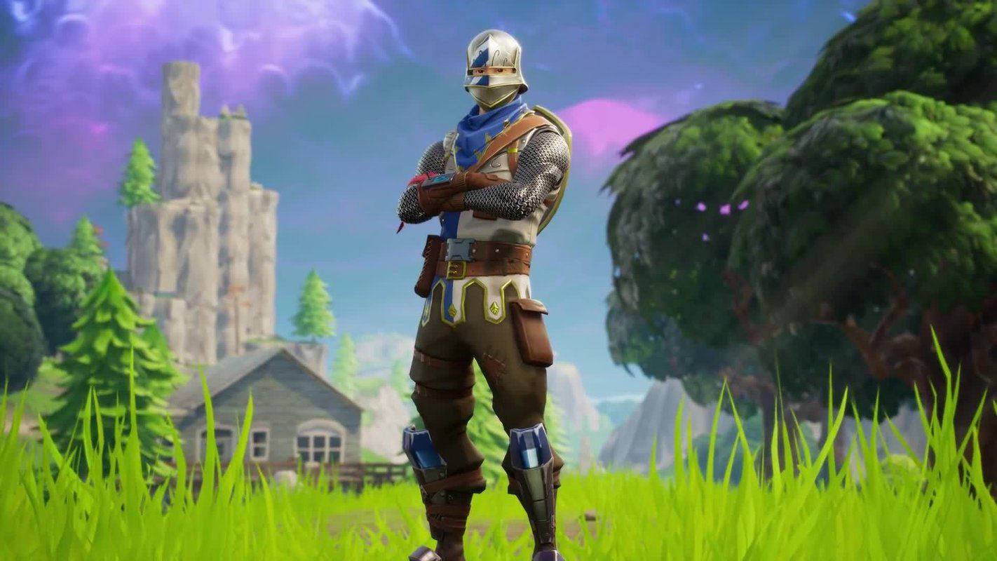 Fortnite Battle Royale Blue Knight Standing On Grass Wallpaper