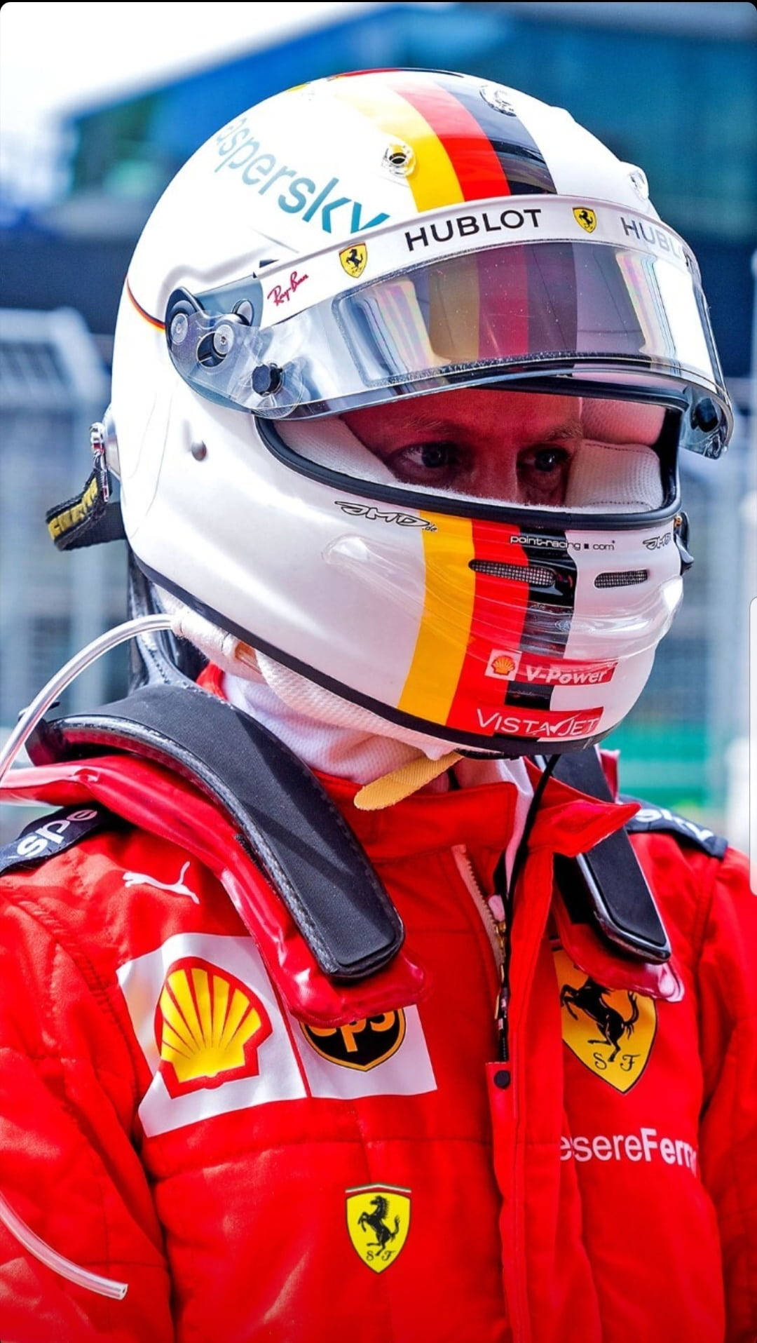 Four-time Formula One World Champion, Sebastian Vettel, In His Racing Suit And Helmet. Wallpaper