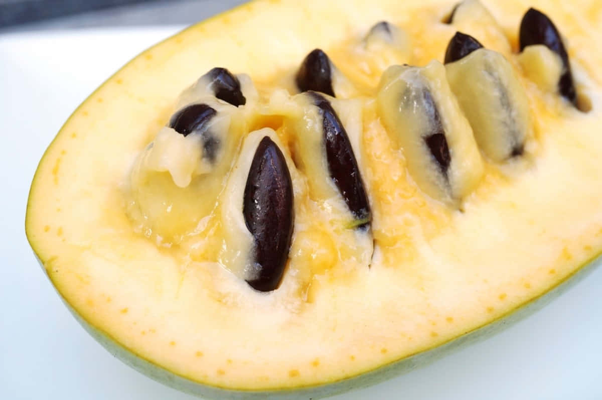 Fresh Halved Pawpaw Fruit Wallpaper