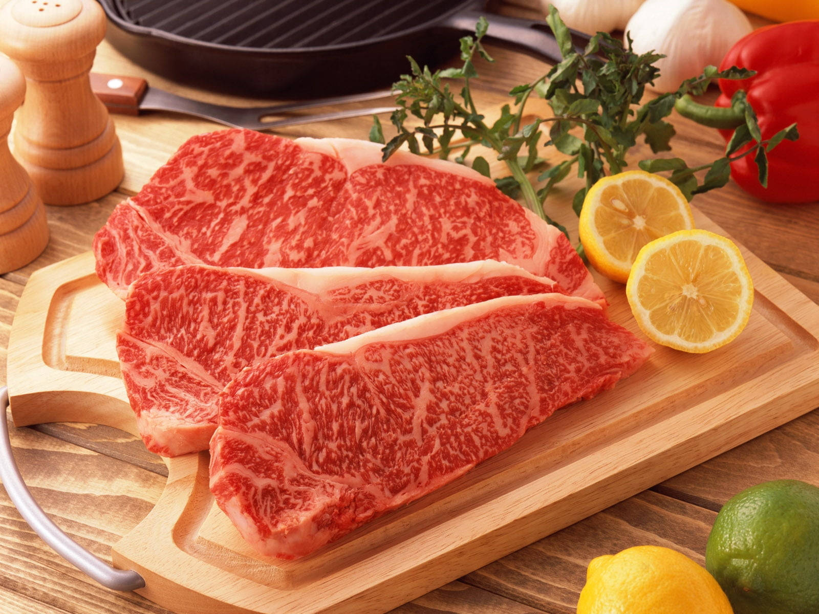 Fresh Kobe Beef On Wooden Cutting Board Wallpaper