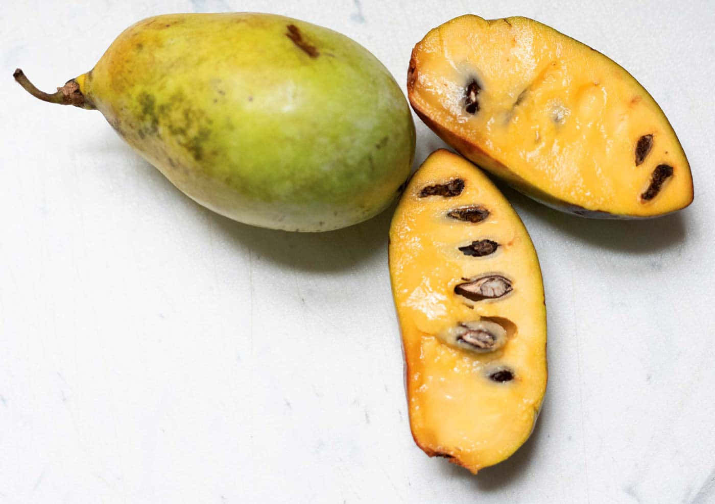 Fresh Pawpaw Fruitand Slices.jpg Wallpaper