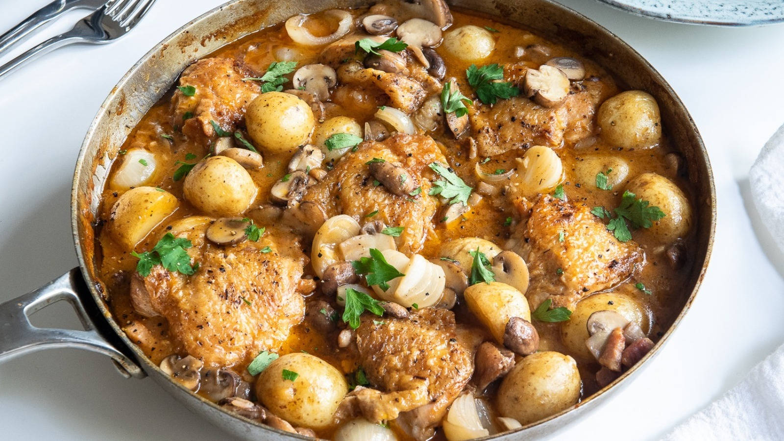 Freshly Cooked Coq Au Vin In An Aluminum Pan Wallpaper