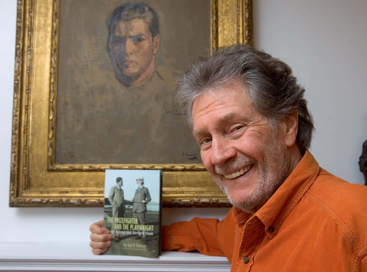 Gene Tunney's Son, Holding His Father's Book Wallpaper