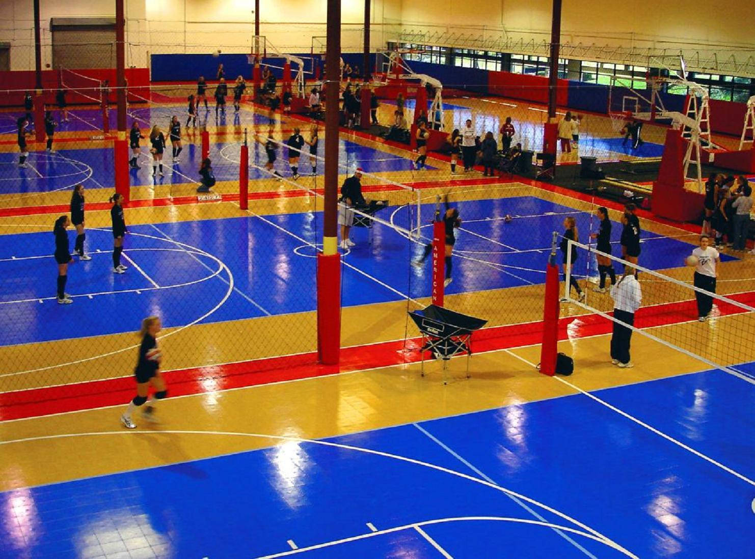 Get Ready For Game Day And Make Your Dibs On The Court For An Indoor Volleyball Match. Wallpaper