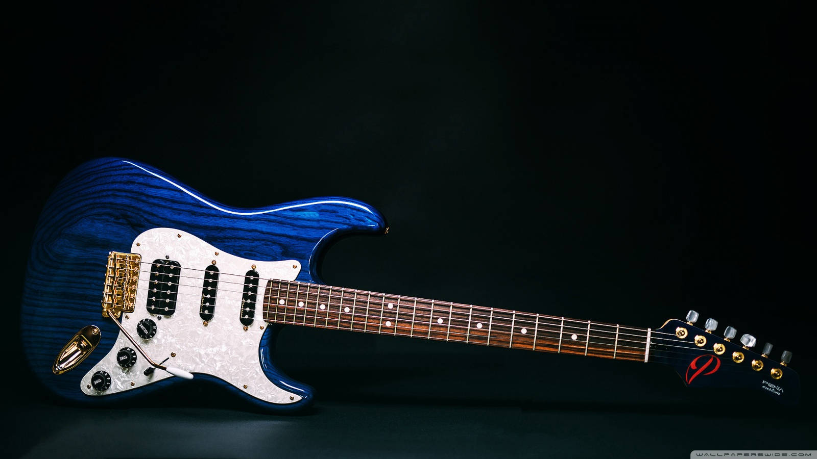 Get Ready To Jam Out With A Royal Blue Electric Guitar Wallpaper