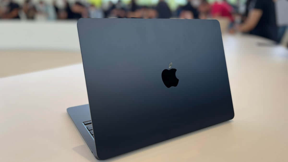 Get Ready To Take On The World With Black Macbook Wallpaper