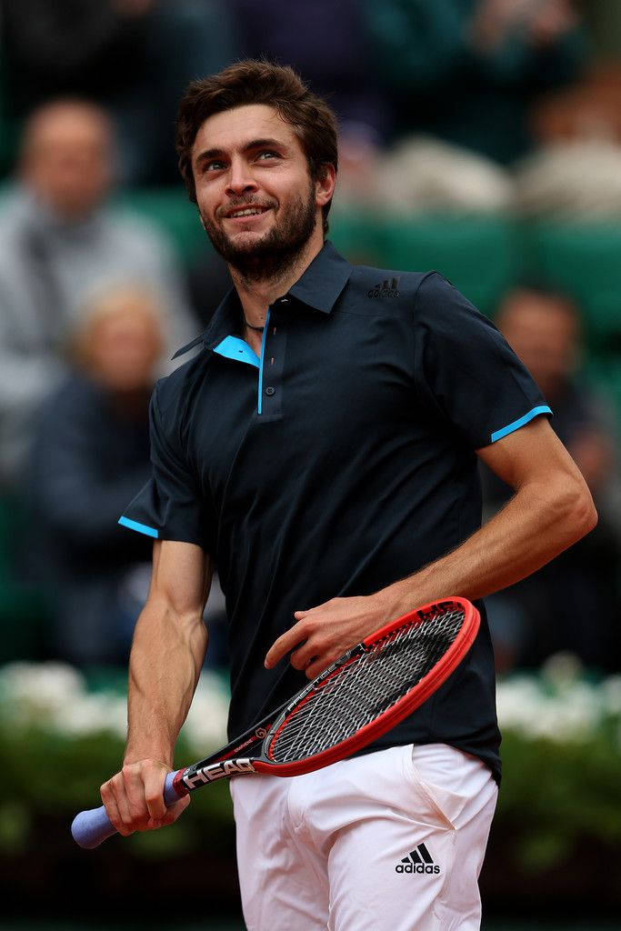 Gilles Simon Smiling During Match Wallpaper