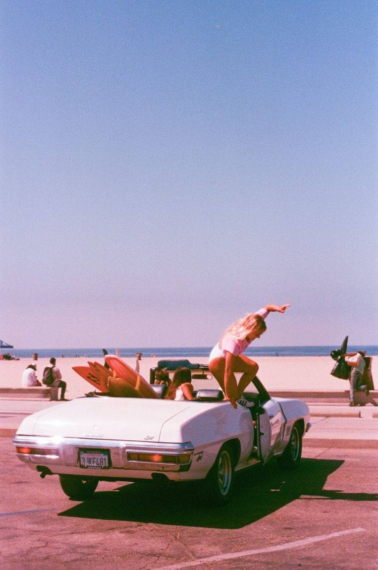 Girl Jumping Off Vintage 90's Aesthetic Wallpaper