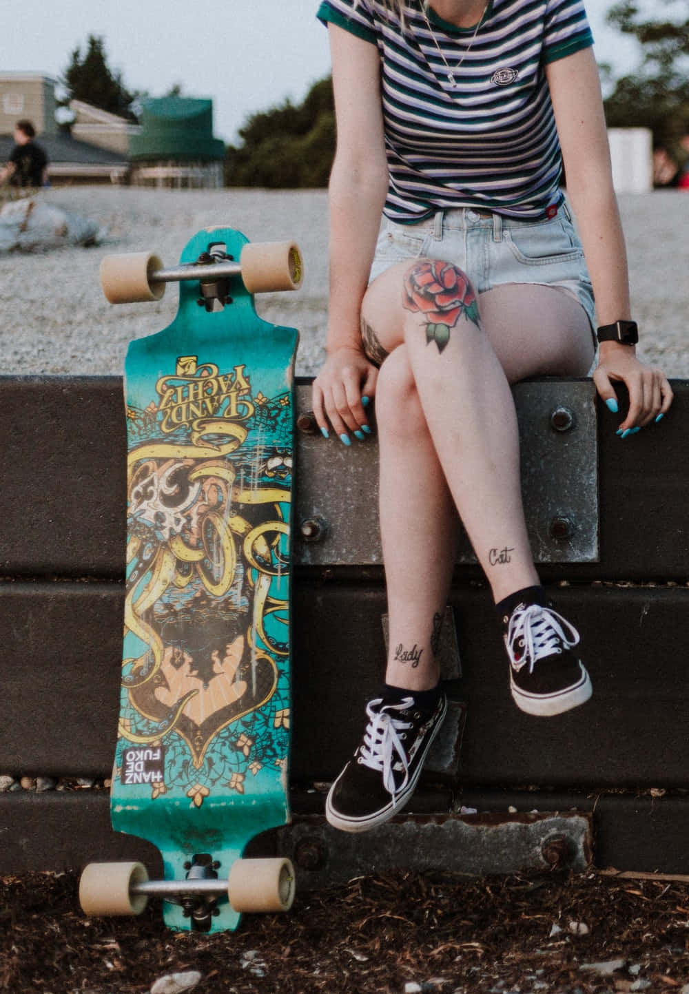 Girl Sitting Retro Skateboard Wallpaper