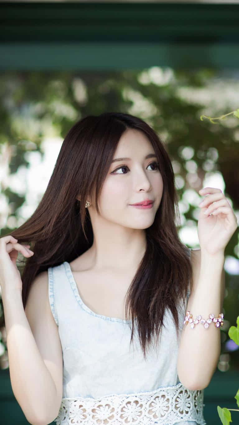 Graceful Asian Beauty In White Wallpaper