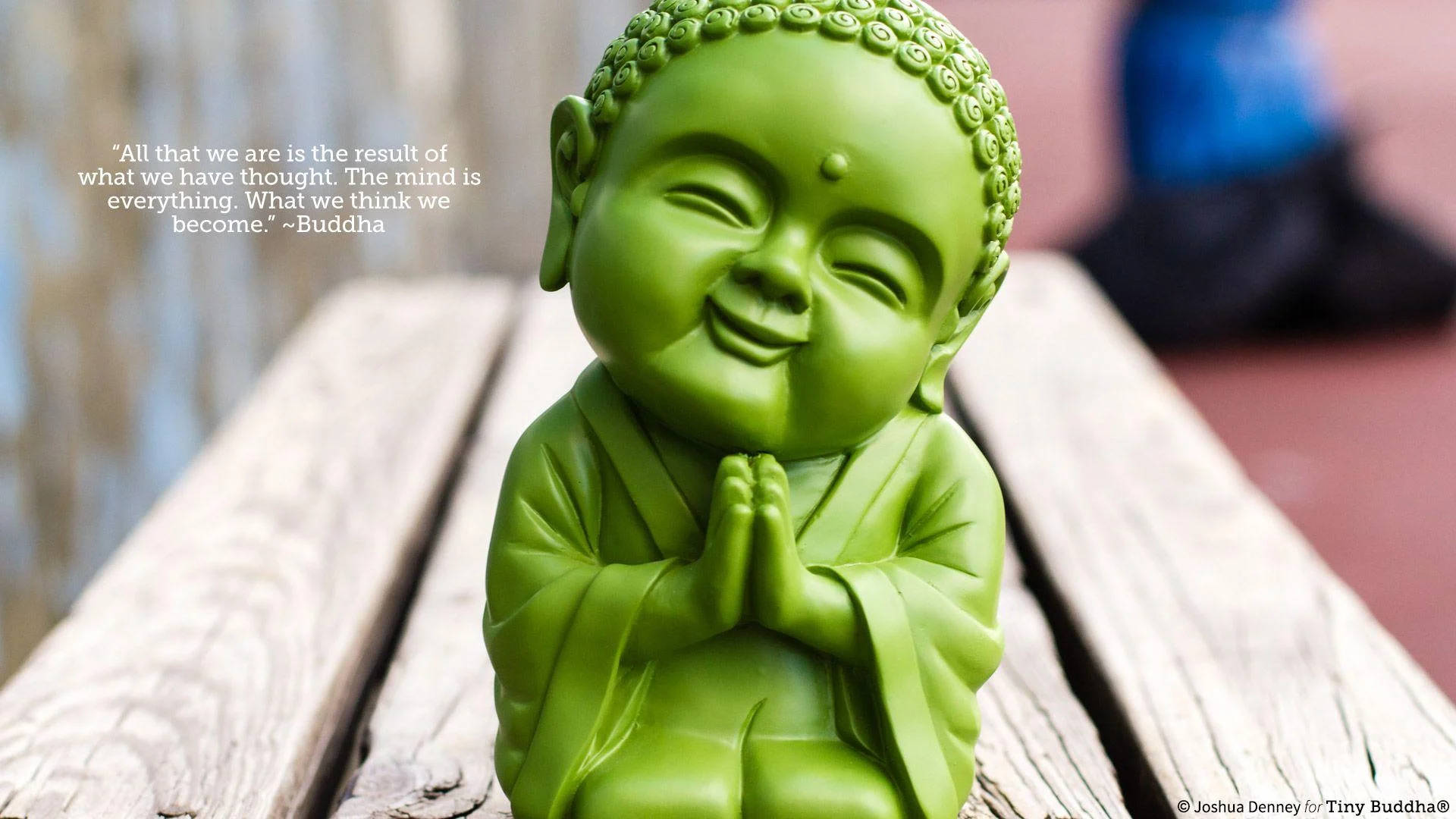 Green Laughing Buddha Figurine Wallpaper