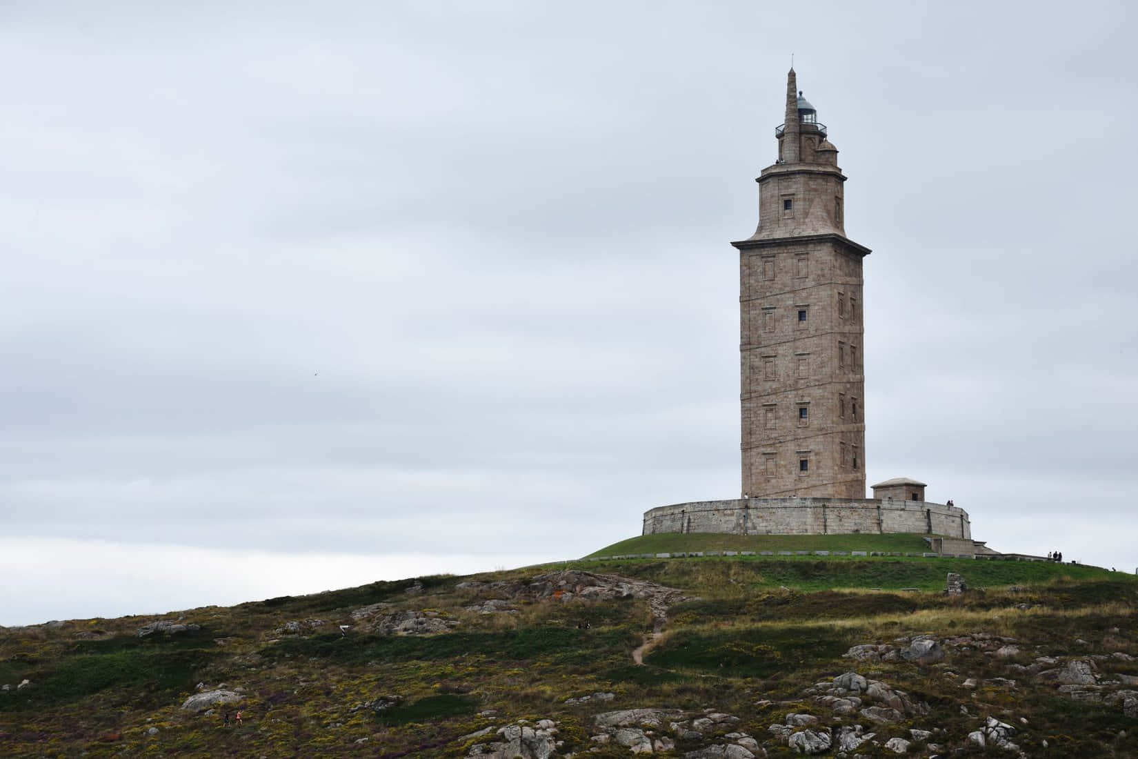 Grey Aesthetic Sky Tower Of Hercules Wallpaper