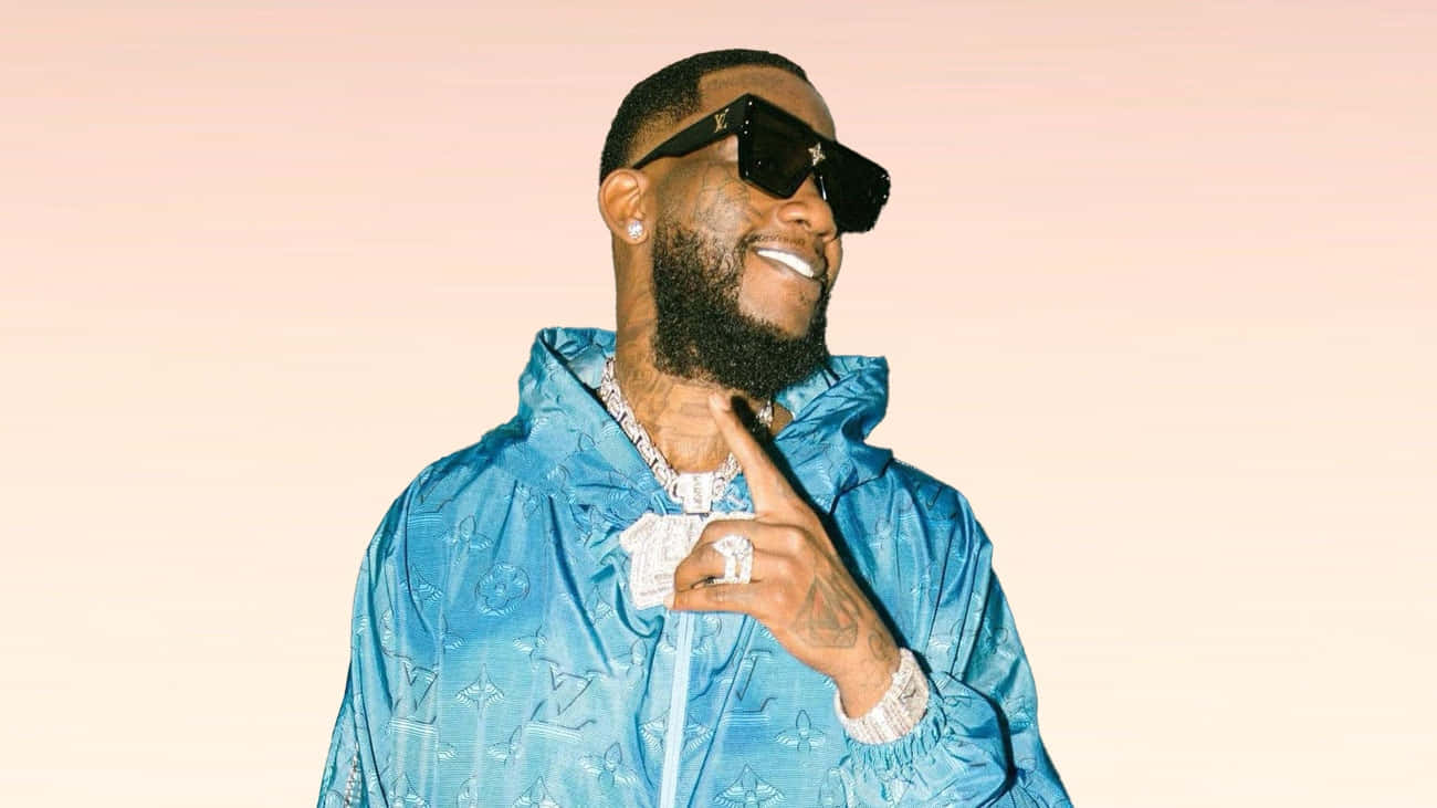Gucci Mane Blue Jacket Pose Wallpaper
