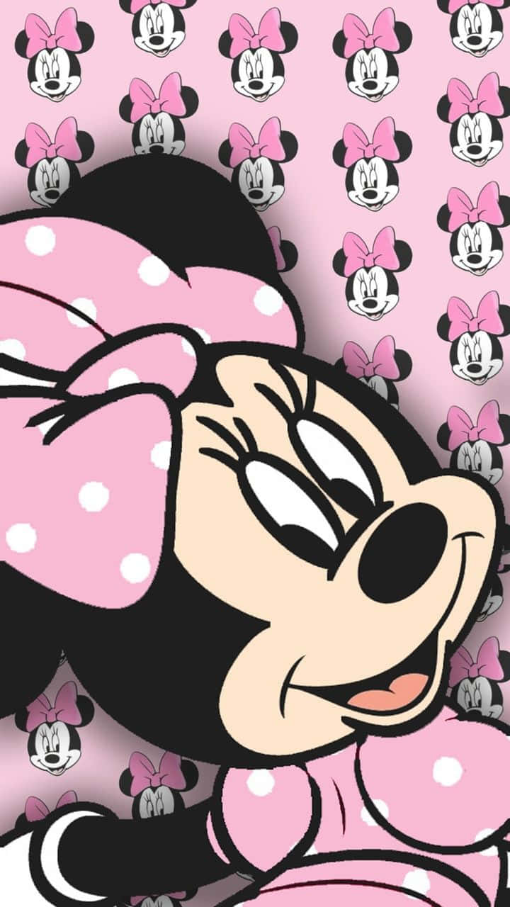 Have Fun With Minnie Mouse, Dressed Up In Her Signature Colors. Wallpaper