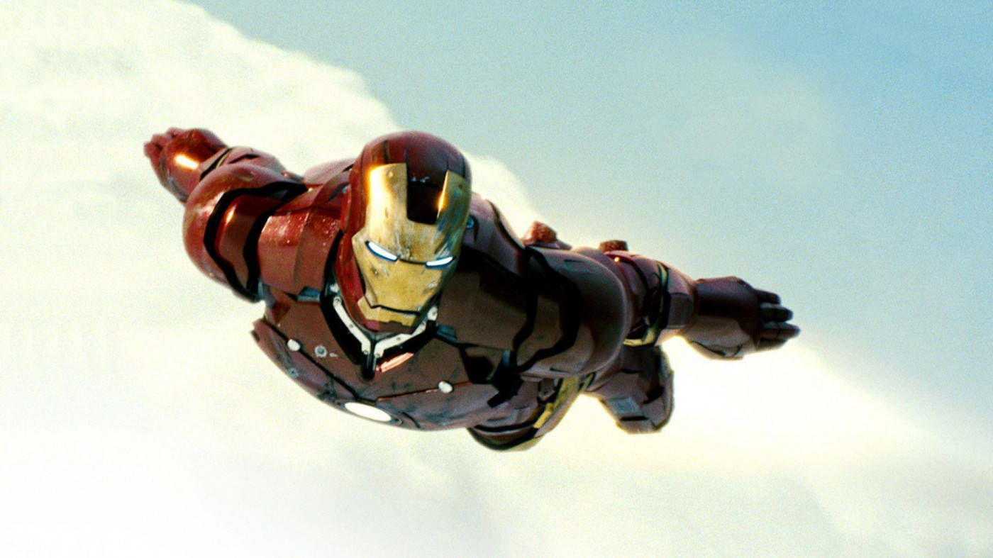 Hd Iron Man Flying In The Clouds Wallpaper