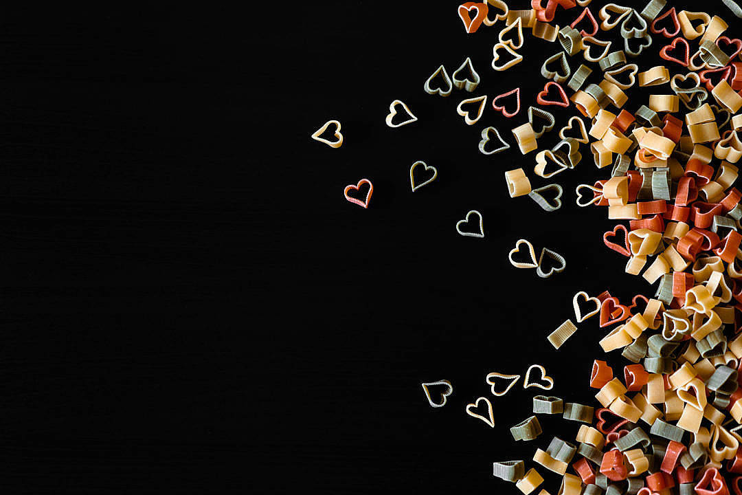 Heart-shaped Pasta On Black Color Background Wallpaper