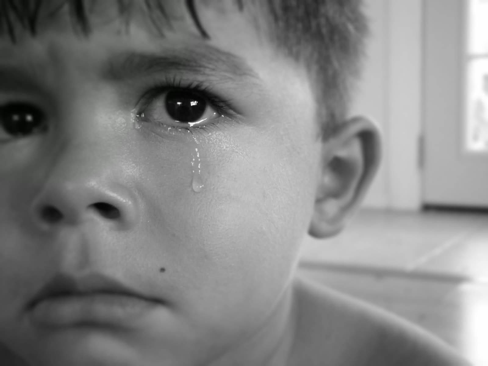 Heartbroken Boy Overwhelmed With Emotions Wallpaper