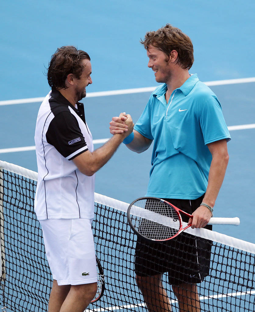 Henri Leconte & Thomas Enqvist Celebratory Handshake Wallpaper