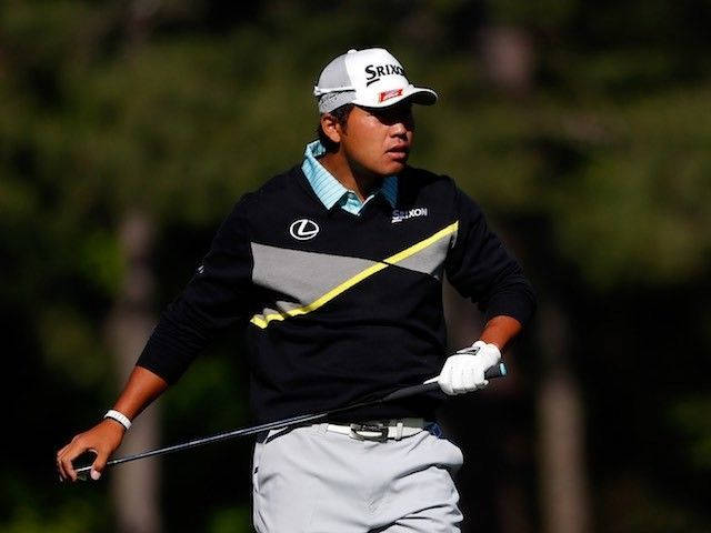 Hideki Matsuyama Poised For A Powerful Swing During A Golf Tournament. Wallpaper