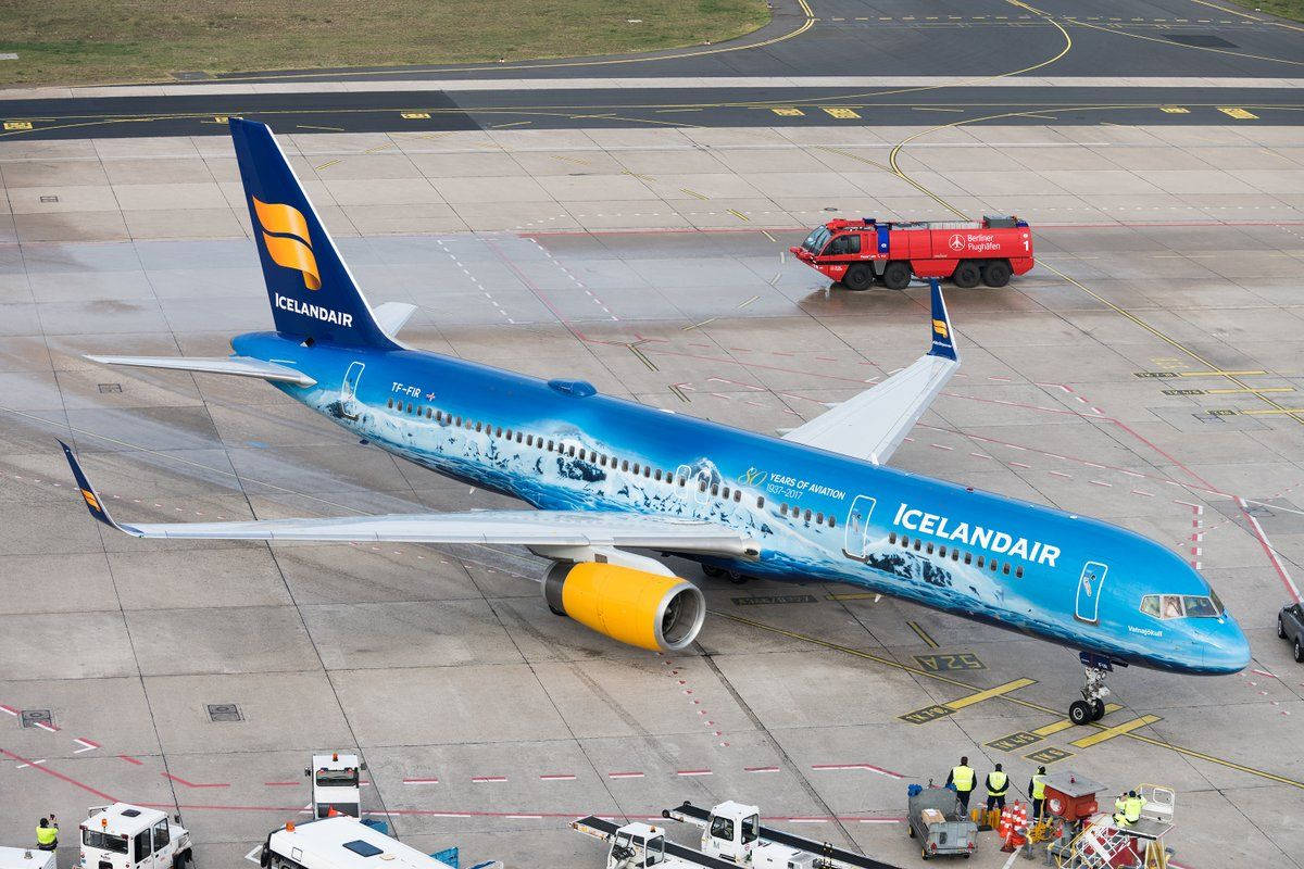 Icelandair Blue Plane On Tarmac Wallpaper