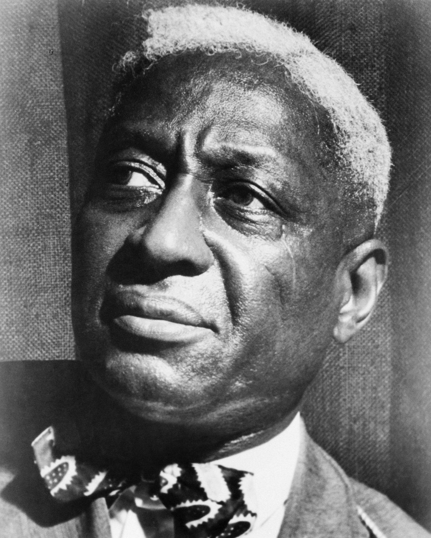 Iconic Black American Blues Singer Leadbelly Wallpaper