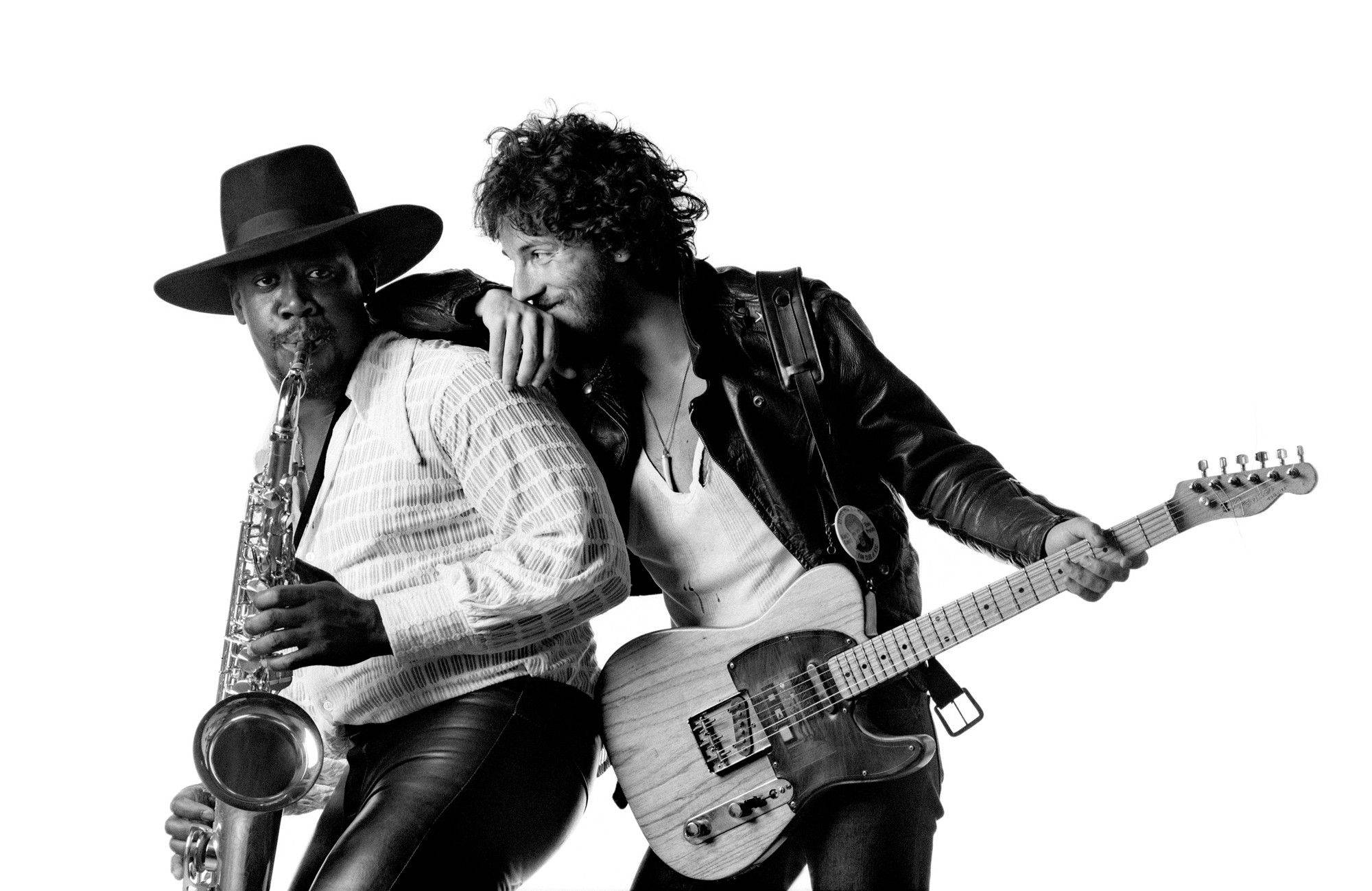 Iconic Duo: Bruce Springsteen And Clarence Clemons In Concert Wallpaper