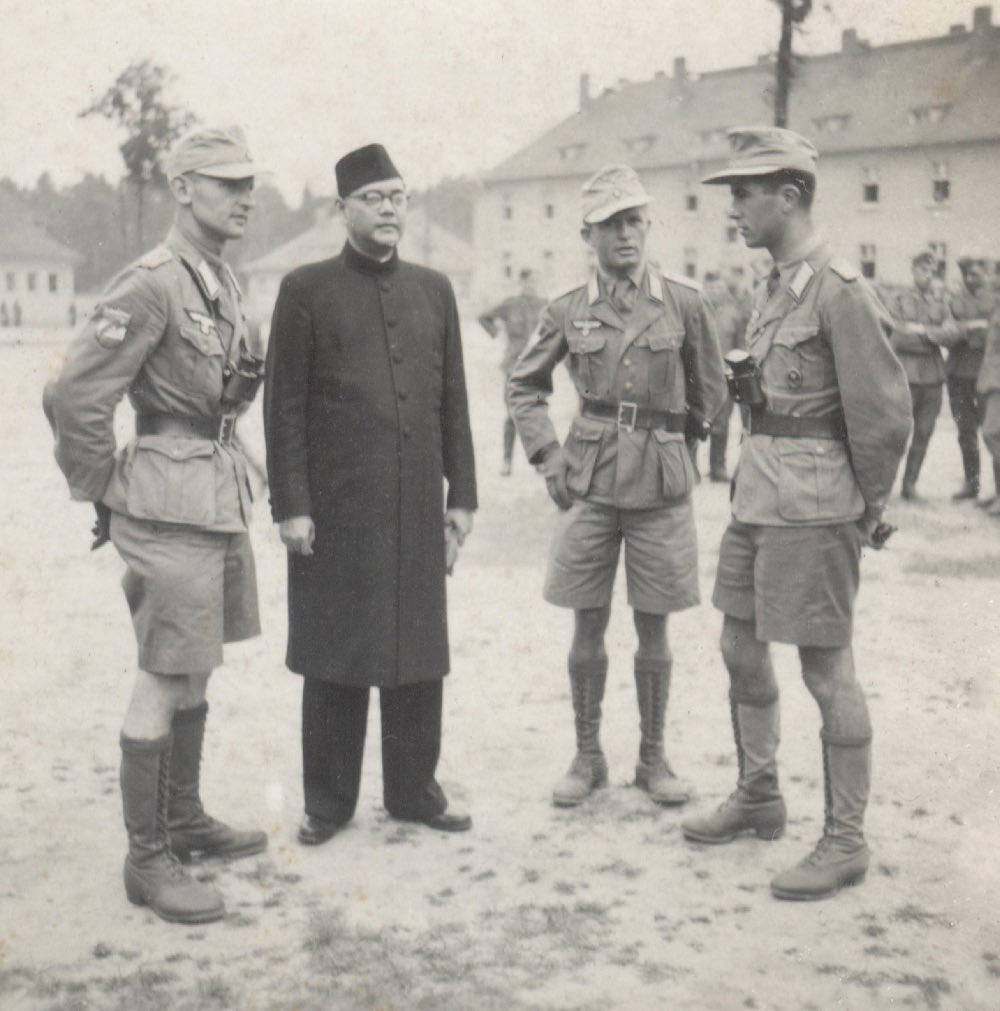 Iconic Image Of Subhas Chandra Bose With German Soldiers Wallpaper
