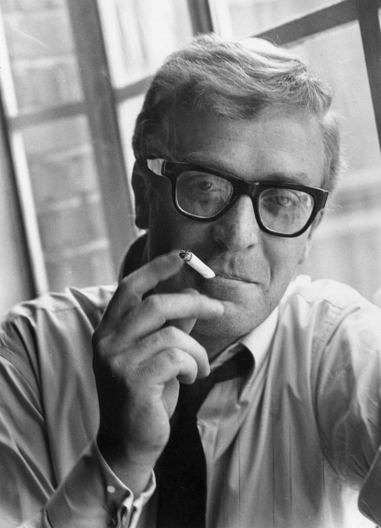 Iconic Vintage Portrait Of Sir Michael Caine Wallpaper