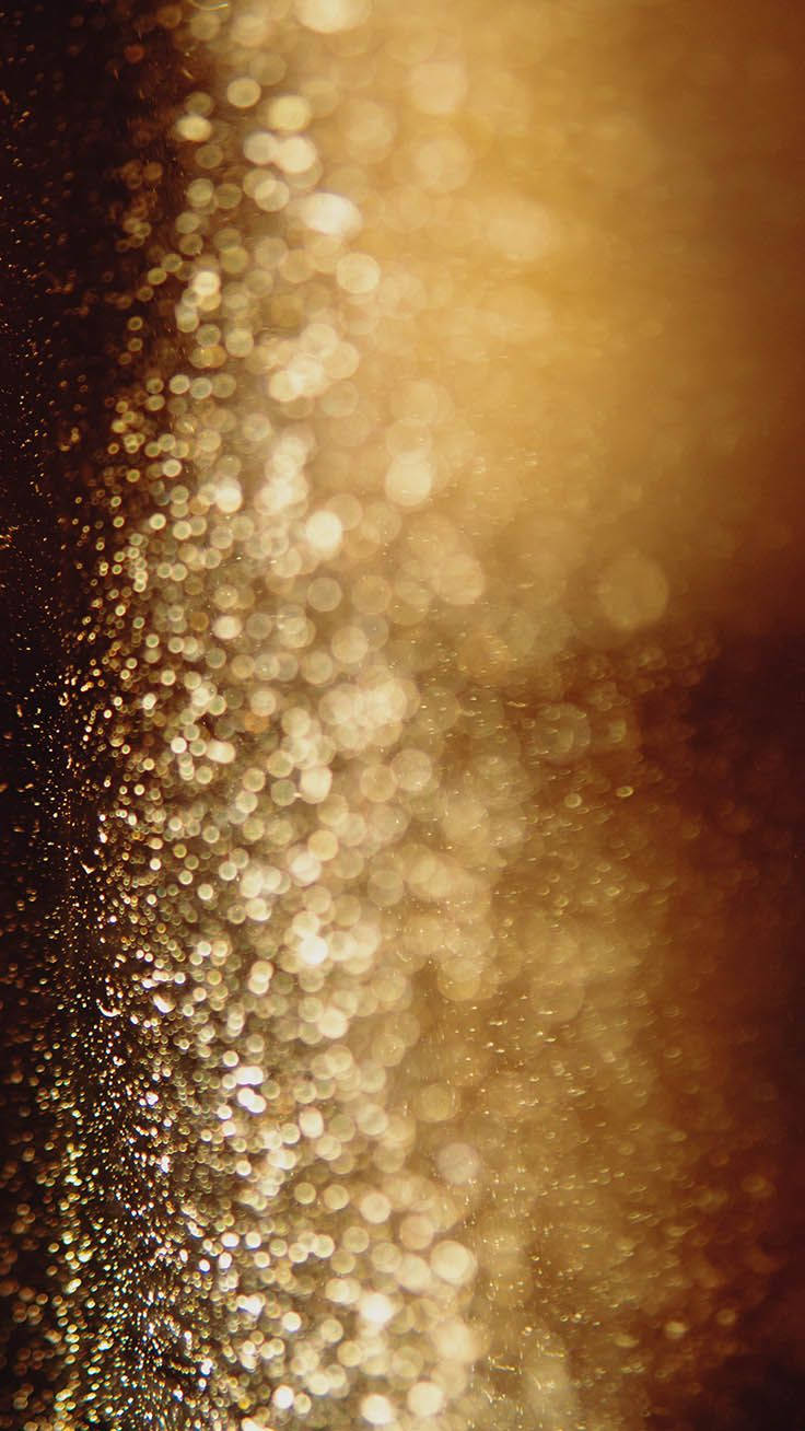 Illuminated Gold Glitters Wallpaper