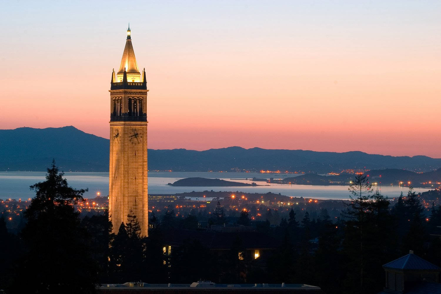 Illuminated Sather Tower At University Of California, Berkeley Wallpaper