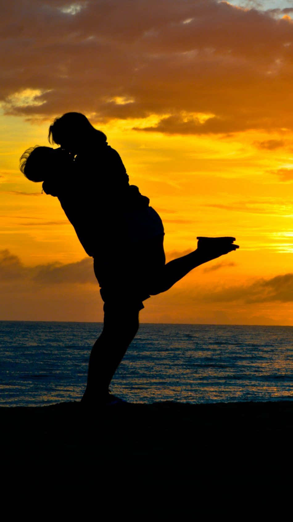 Image A Couple Enjoying A Beautiful Romantic Moment Wallpaper