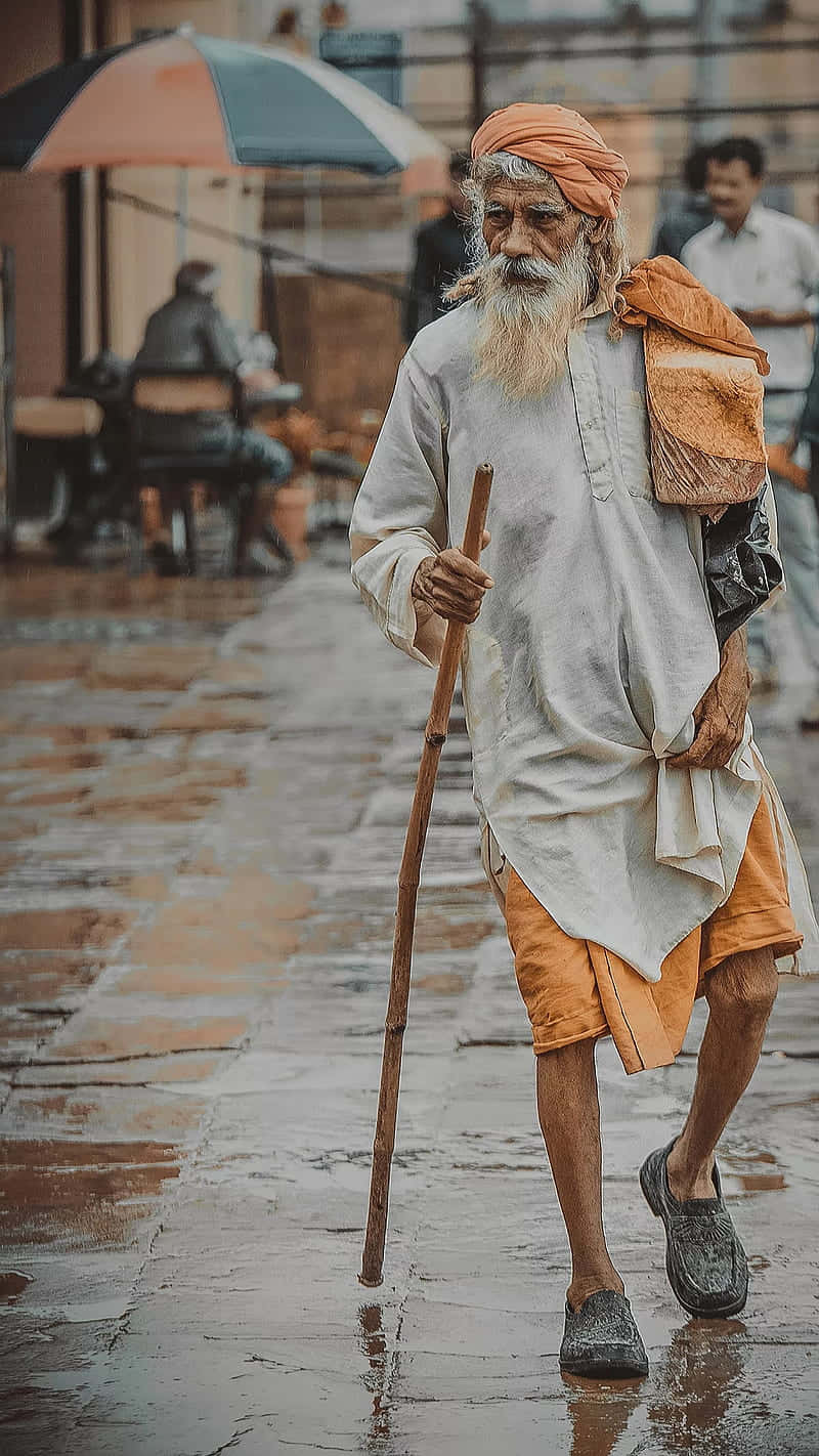 Indian Man With Walking Stick Wallpaper