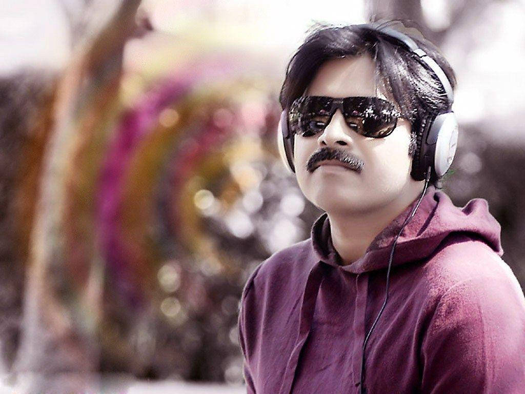 Indian Politician Pawan Kalyan In A Contemplative Pose Wallpaper