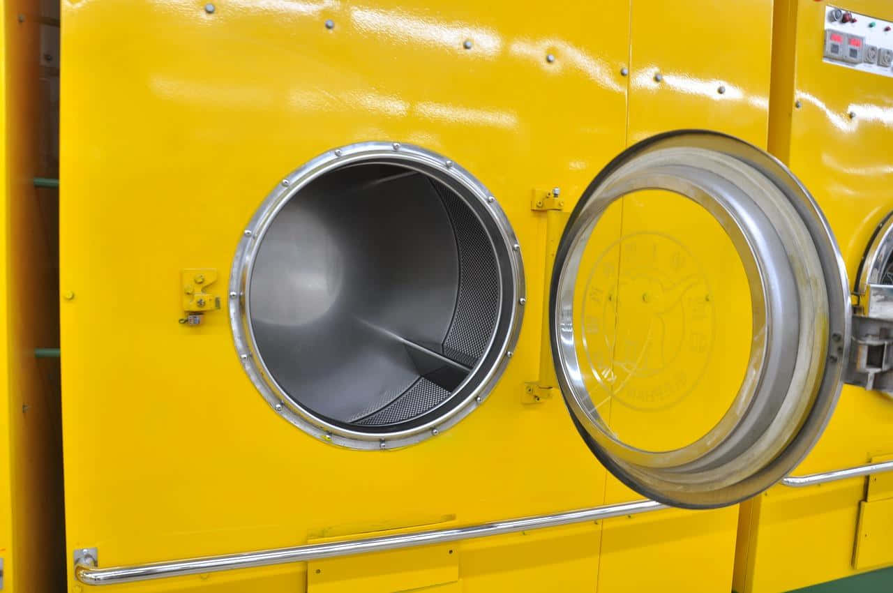 Industrial Yellow Washing Machine Wallpaper