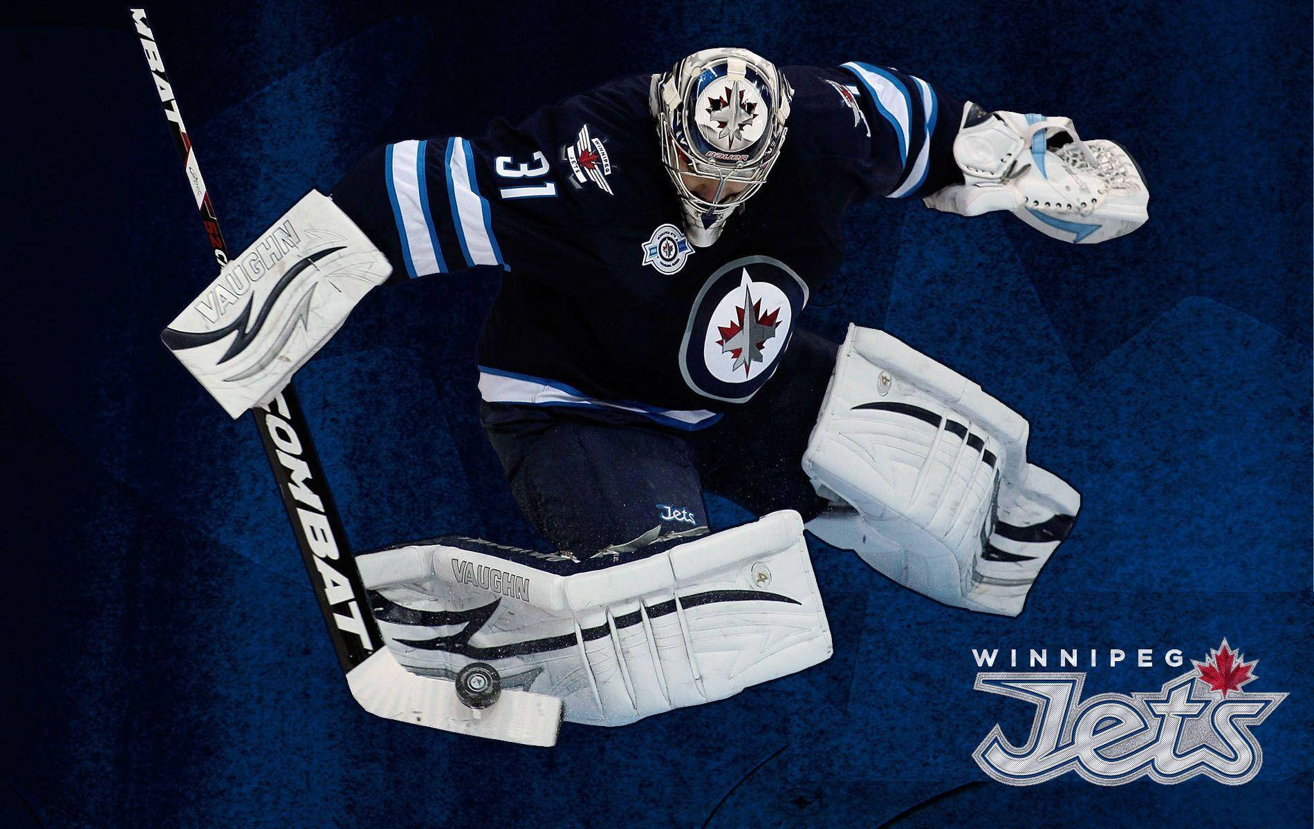 Intense Game Moment With Winnipeg Jets Player Wallpaper