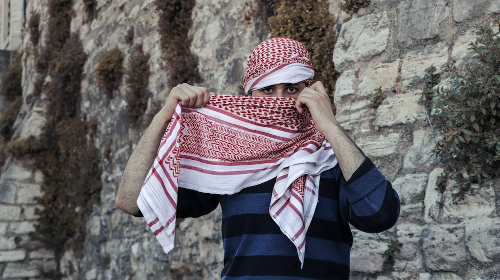 Islamic Boy Red Checkered Scarf Wallpaper