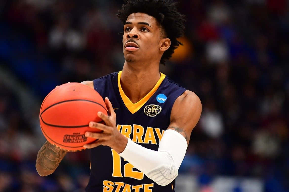 Ja Morrant Holding A Ball Wallpaper