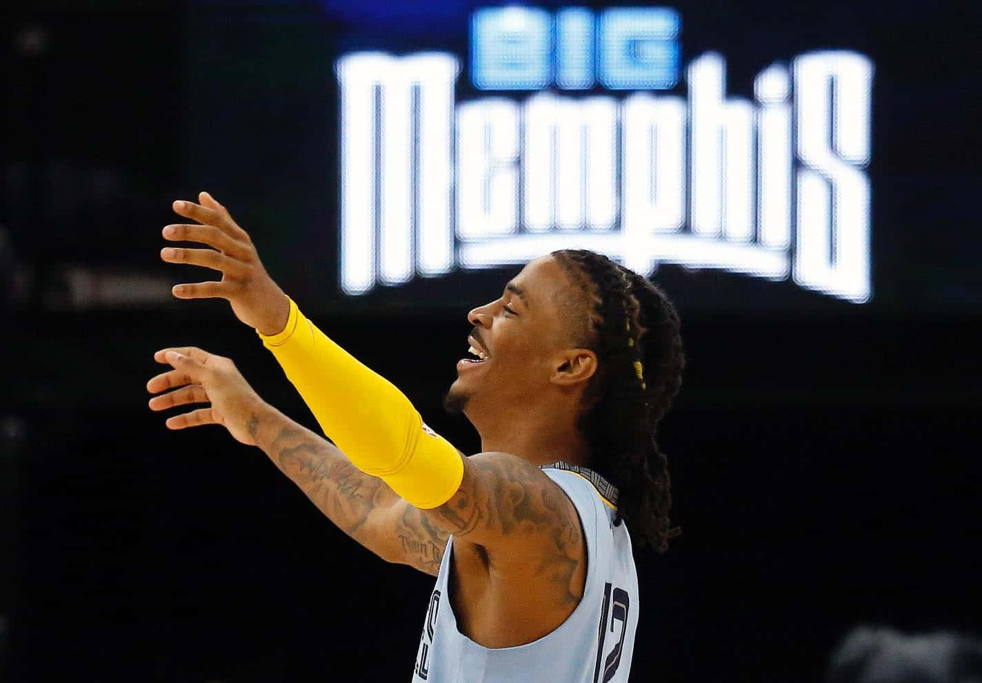 Ja Morrant Raising Both Hands Wallpaper