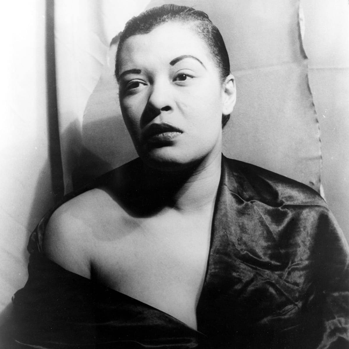 Jazz Icon Billie Holiday Looking Radiant And Elegant Wallpaper