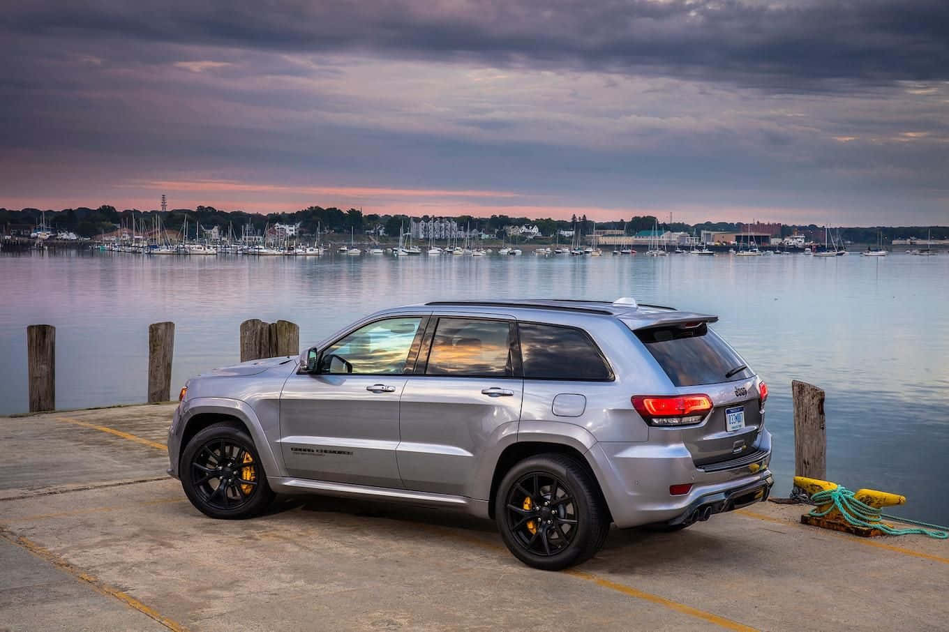 Jeep Trackhawk Under Clouds Wallpaper