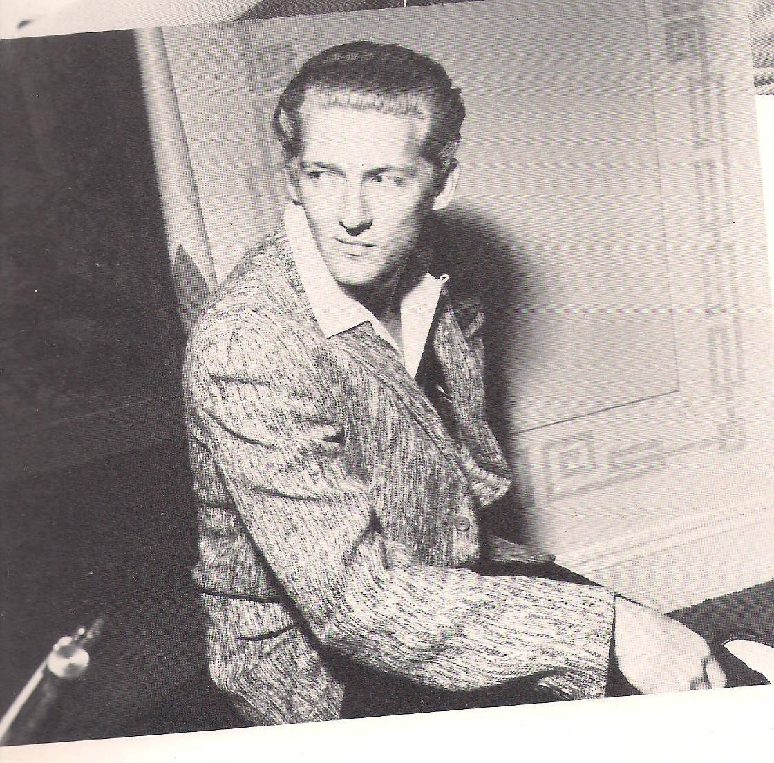 Jerry Lee Lewis Looking At Side Sepia Wallpaper