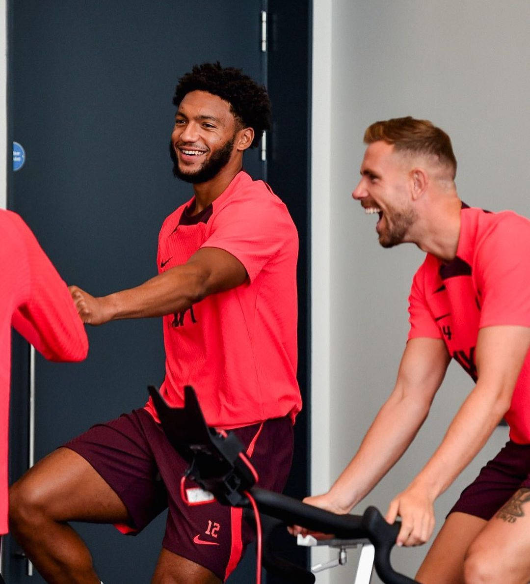 Joe Gomez Exercising With Teammates Indoors Wallpaper