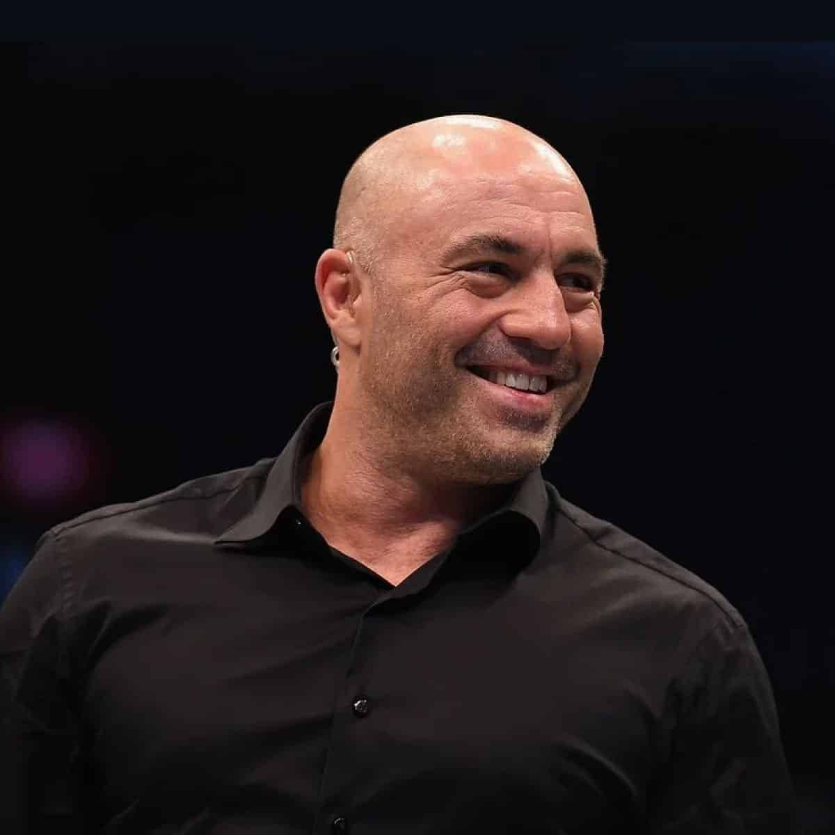 Joe Rogan Cracking A Joke Wallpaper