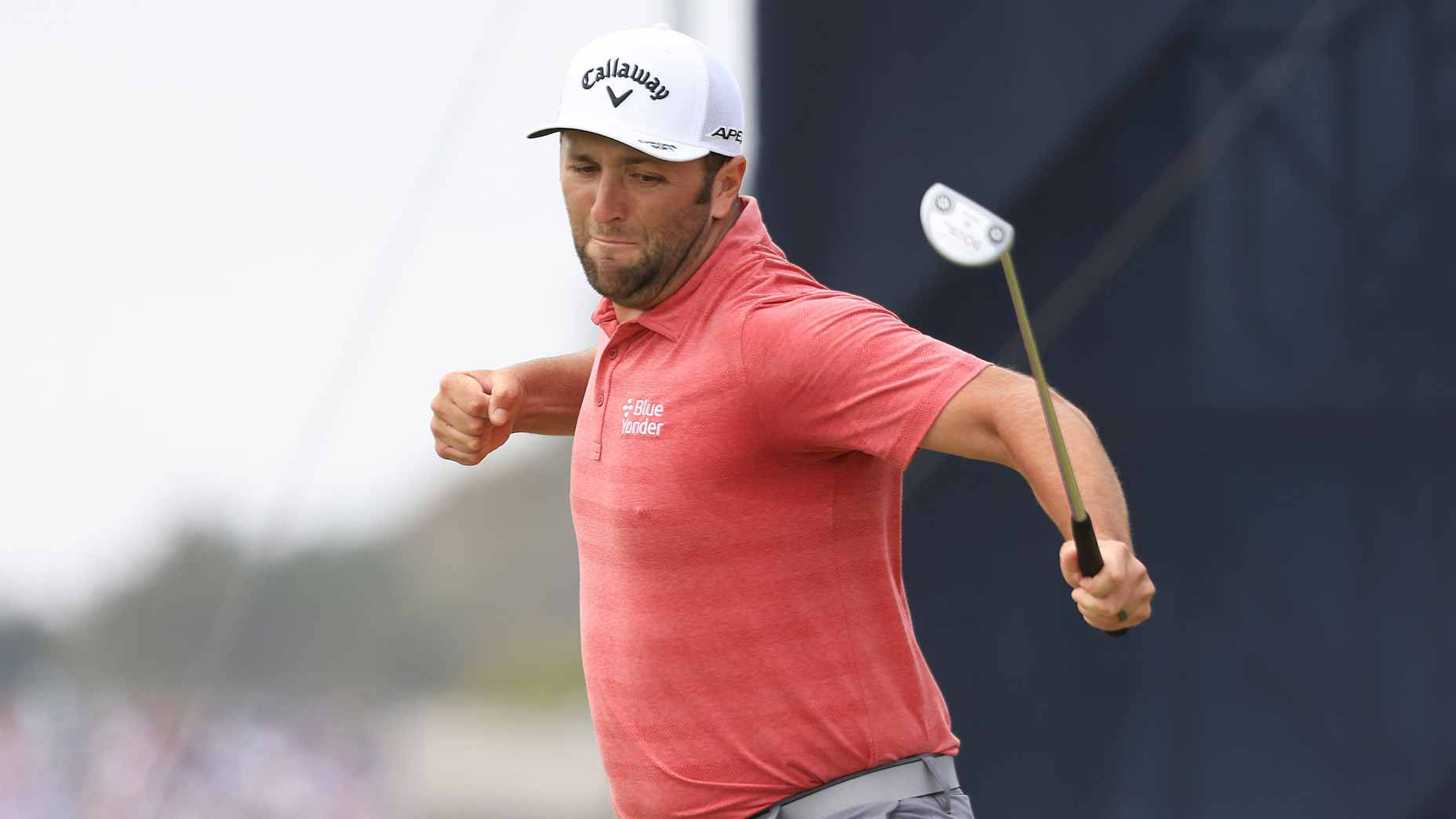 Jon Rahm Jumping For Victory Wallpaper