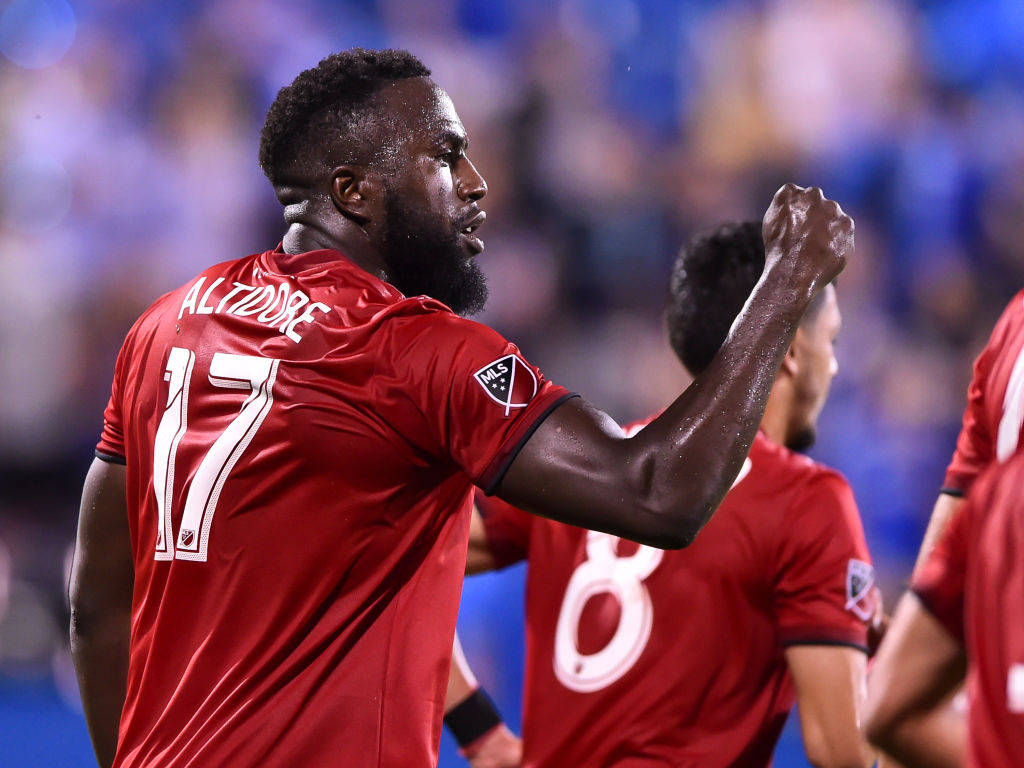 Jozy Altidore Celebrating A Goal With A Fist Pump Wallpaper