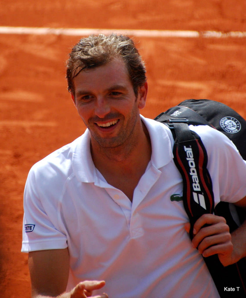 Julien Benneteau Radiating Joy On Court Wallpaper