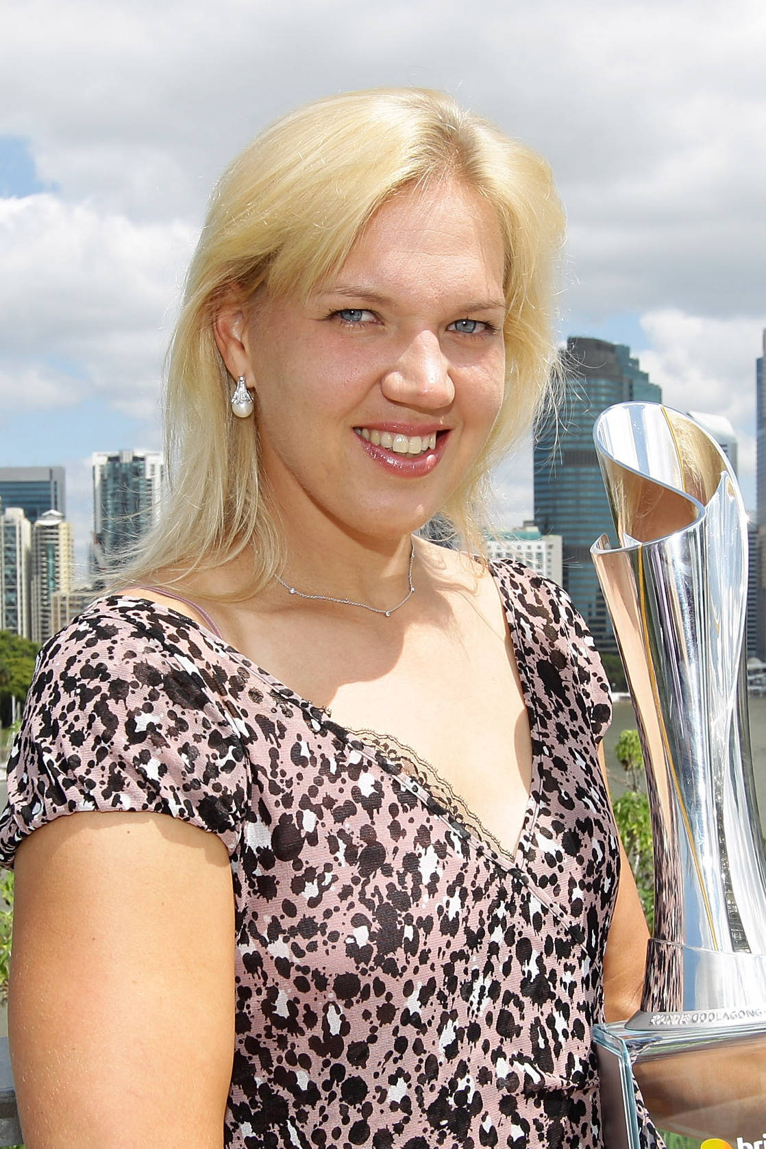 Kaia Kanepi - Champion With Trophy Wallpaper