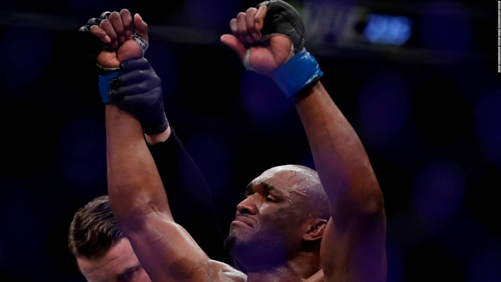 Kamaru Usman Relieved Raised Hands Wallpaper