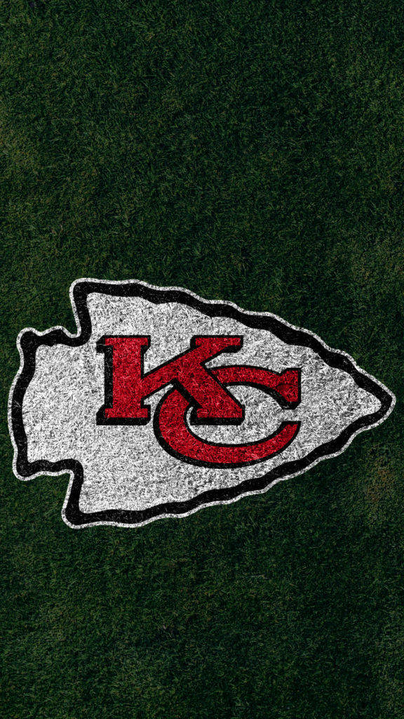 Kansas City Chiefs Logo On Field Wallpaper